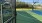 a tennis court with a sign