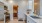 a kitchen with white cabinets