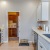 a kitchen with white cabinets