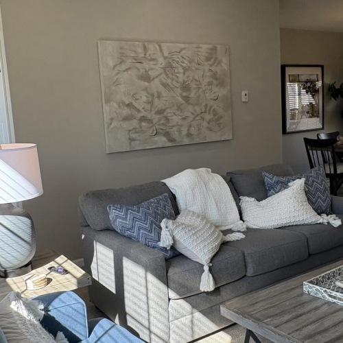Spacious living areas to recline and recharge a living room with a couch and coffee table